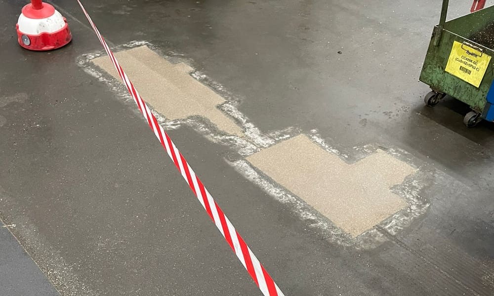 Instandsetzung von Schlaglochern in einem Industriebetrieb